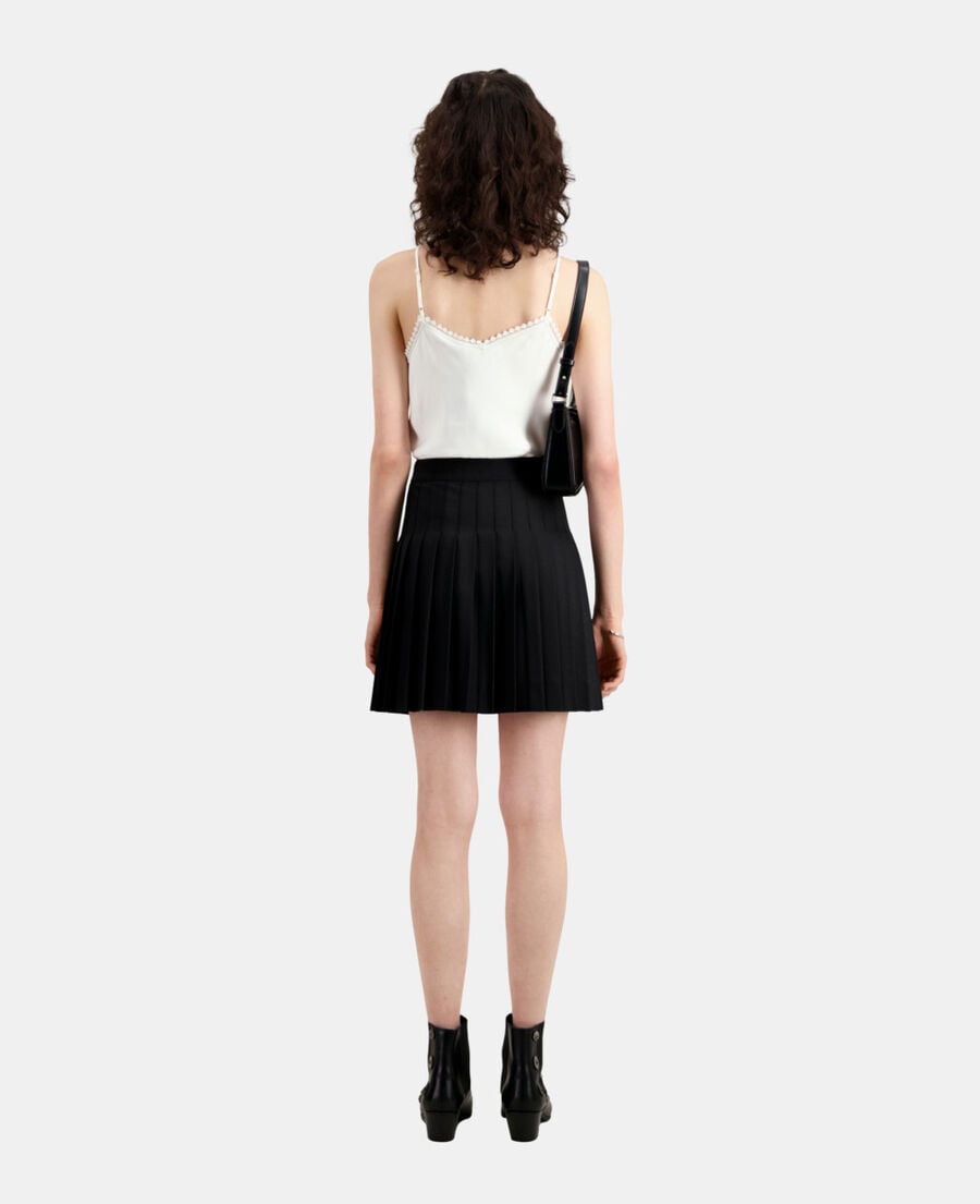 Short black pleated skirt