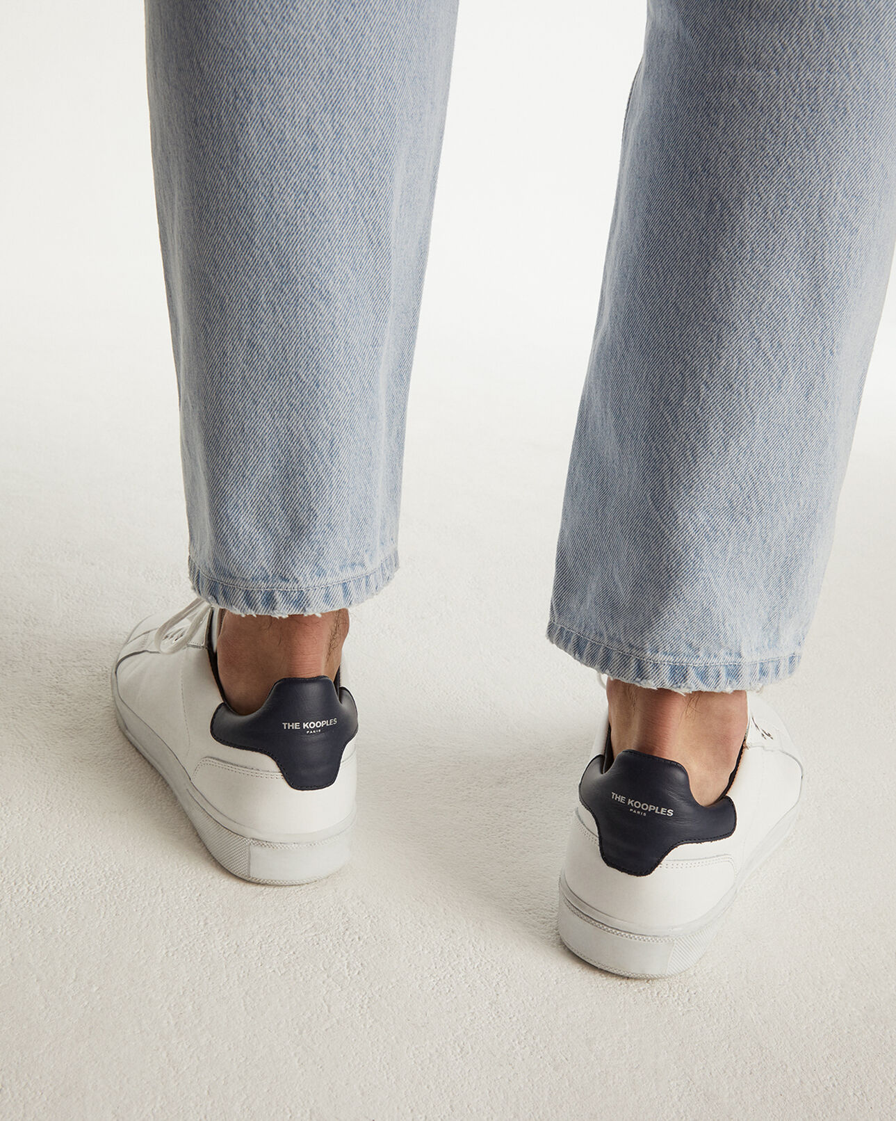 The Kooples MEN WHITE / BLUE white sneakers in leather with blue tongue