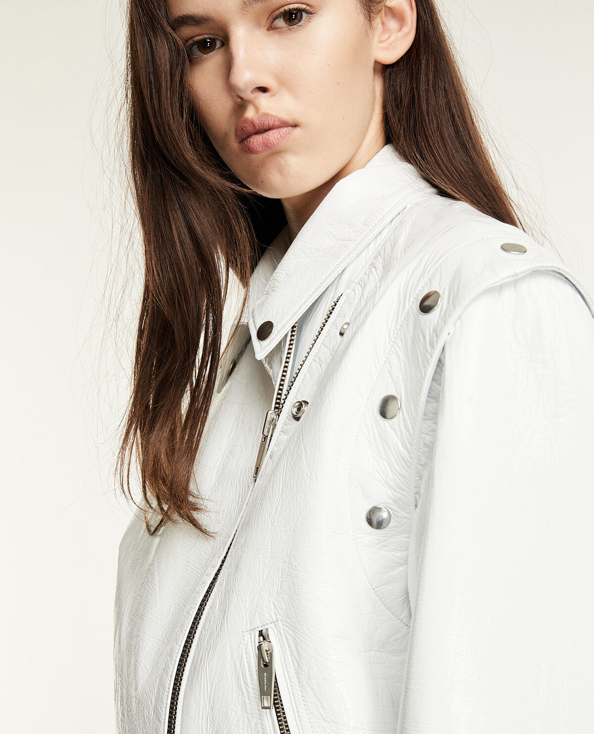 White leather jacket with detachable sleeves