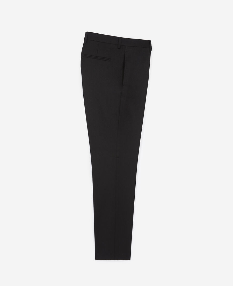 slim-fitting black flannel trousers with piping