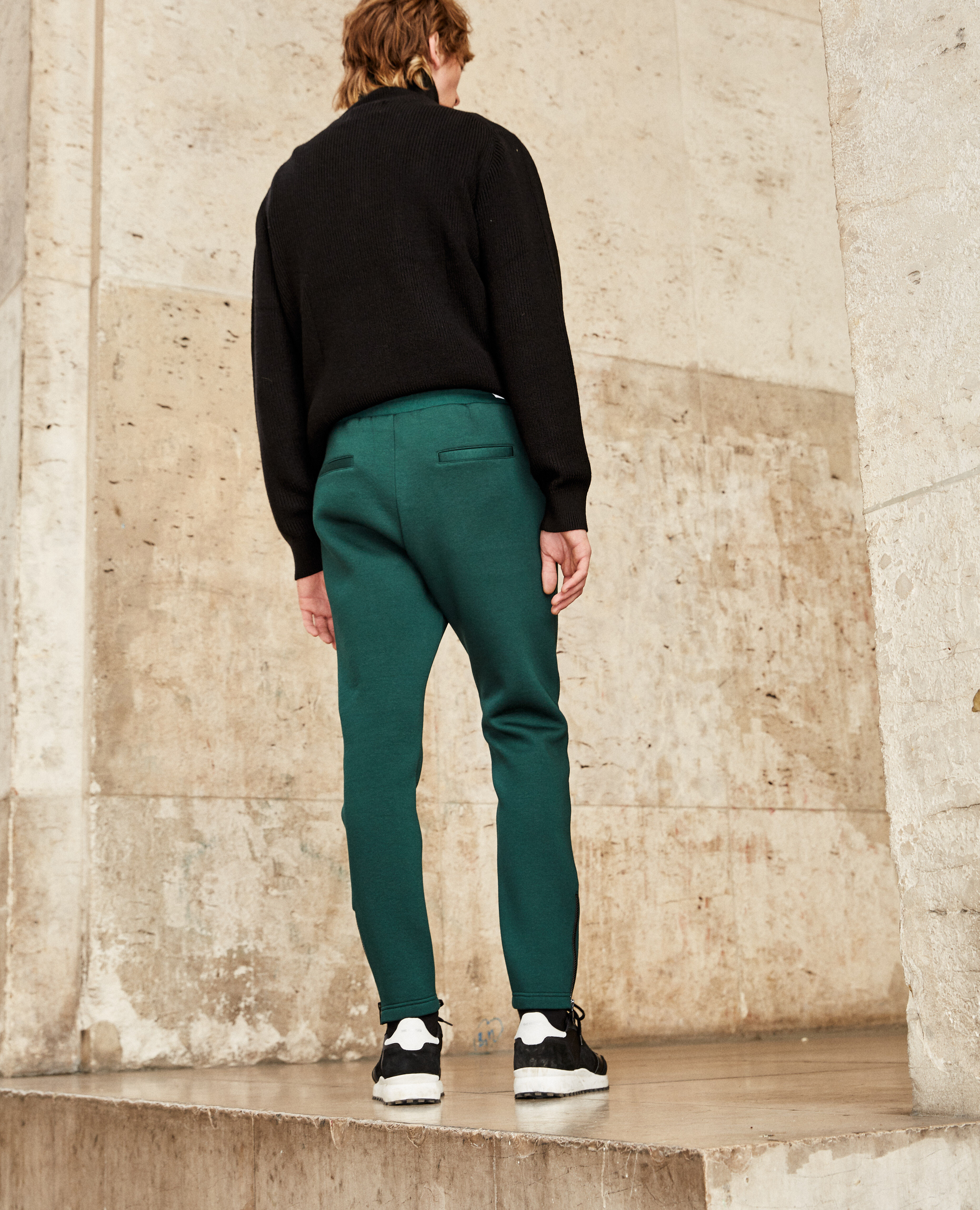 Fitted green joggers with zippers
