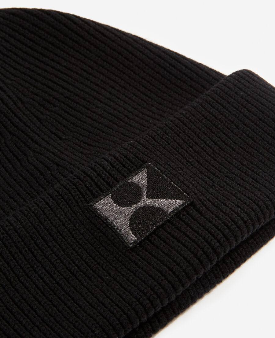 black wool beanie with embroidered k patch
