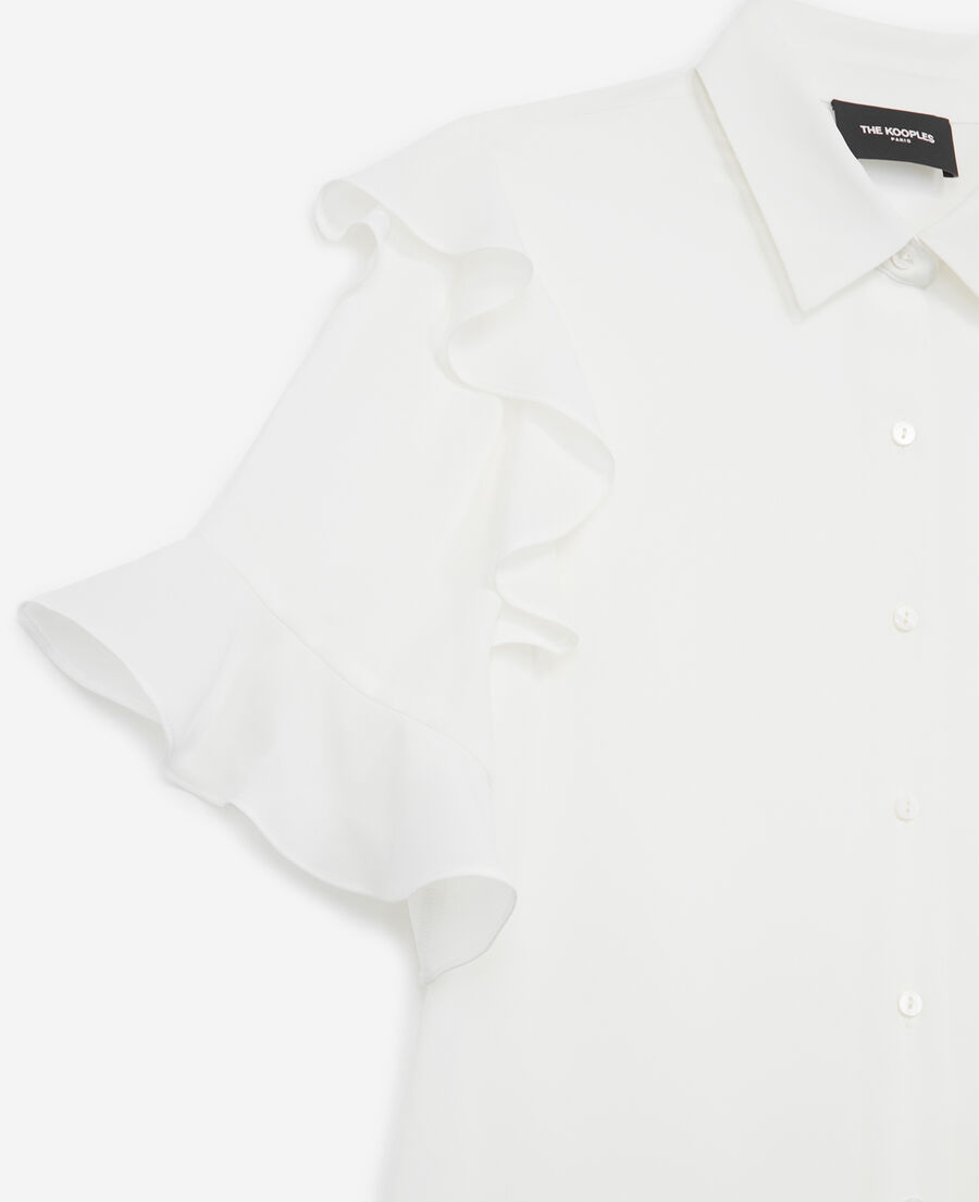 white shirt with pearly buttons