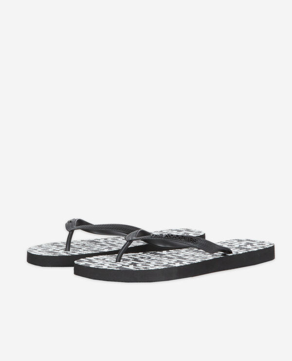 black rubber flip-flops with all-over print