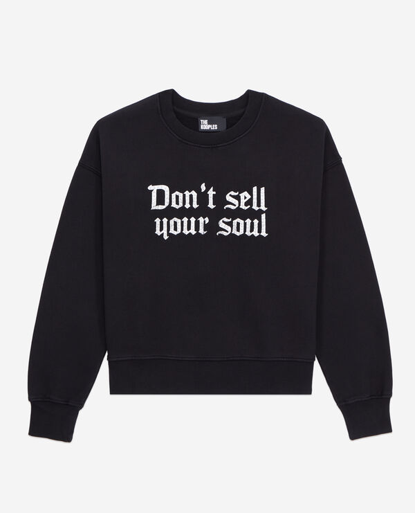 black sweatshirt with don't sell your soul serigraphy