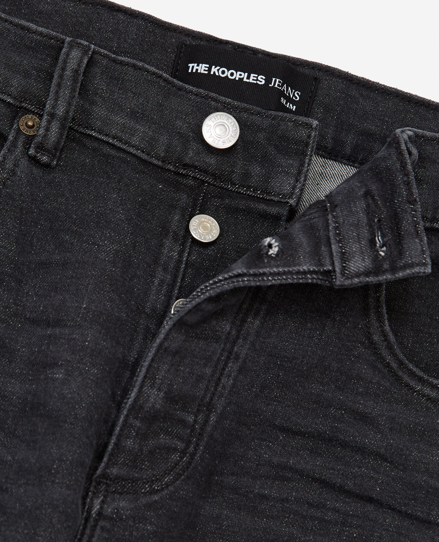 Faded slim fit black jeans with pockets The Kooples
