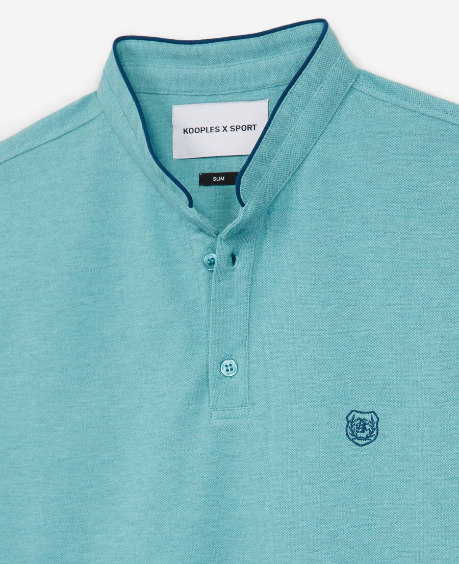 green jersey polo with contrasting details