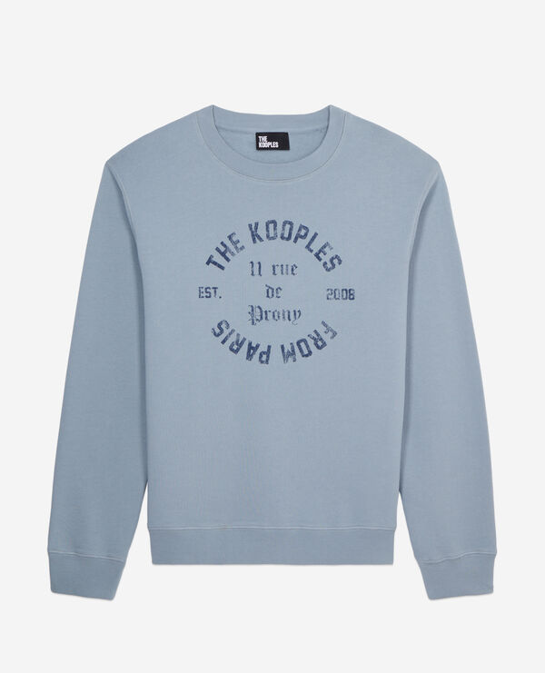 light blue sweatshirt with 11 rue de prony serigraphy
