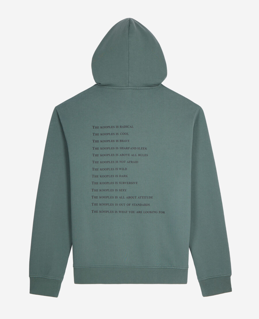 grünes kapuzensweatshirt „what is“