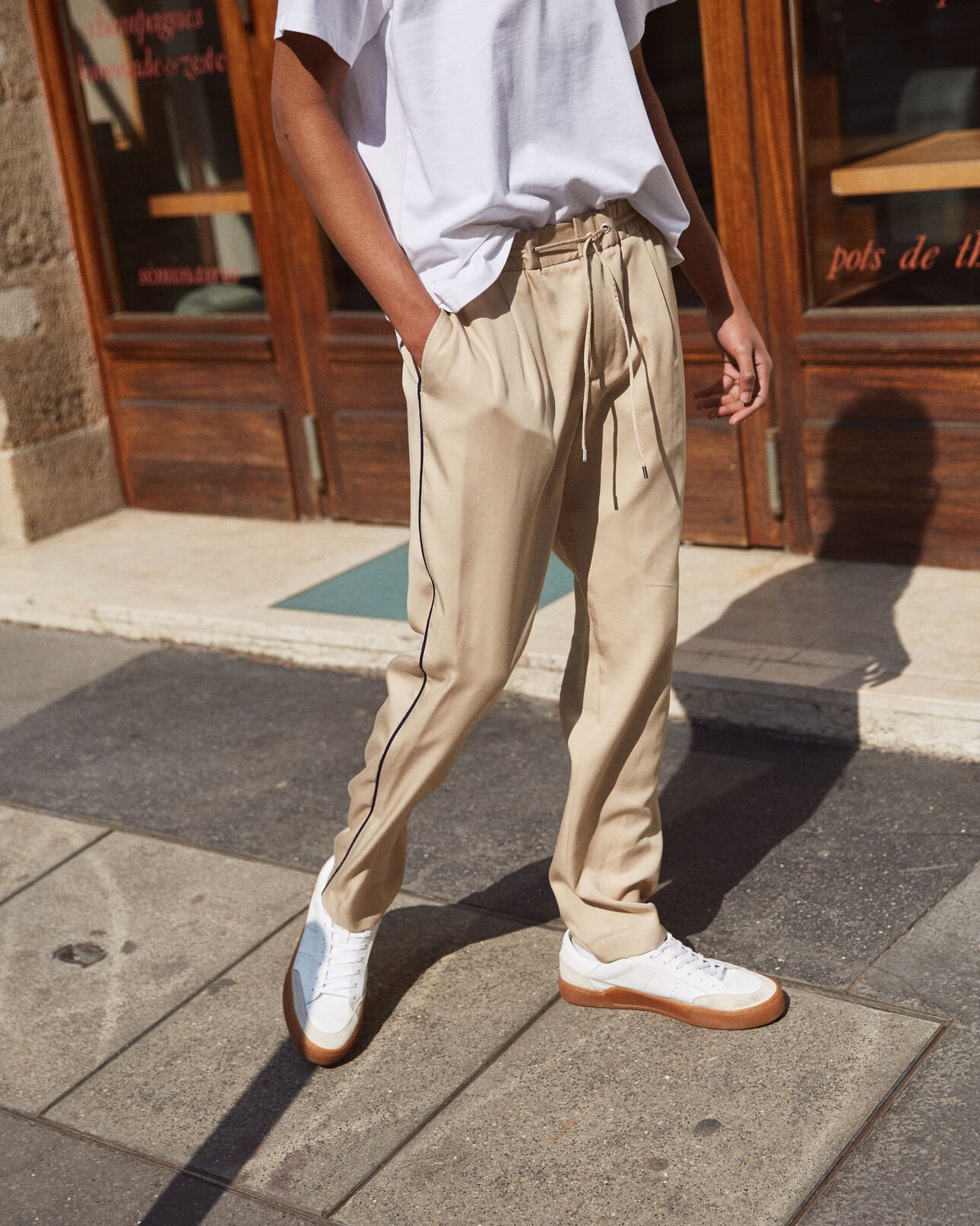 The Kooples MEN VIGOGNE MELANGE/DARK NAVY loose, beige cotton twill trousers with woven blue piping