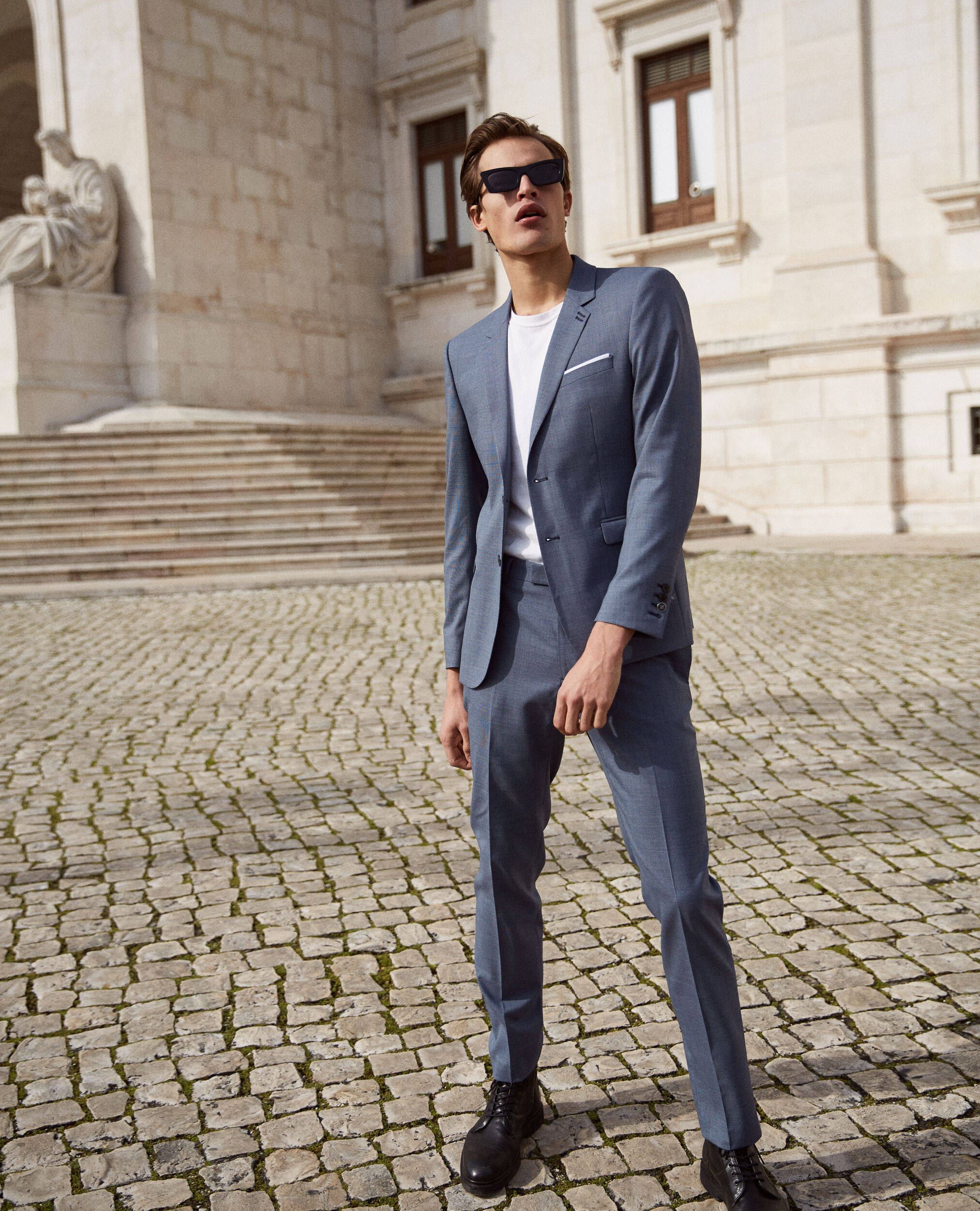 Blue wool suit trousers with micro motif