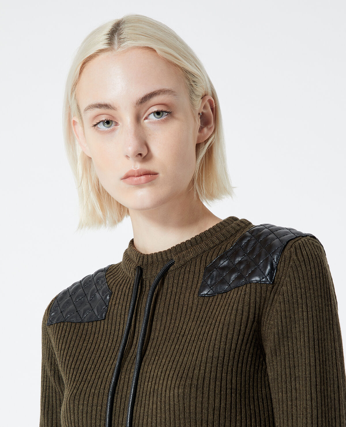 Khaki sweater w leather insert over shoulders The Kooples