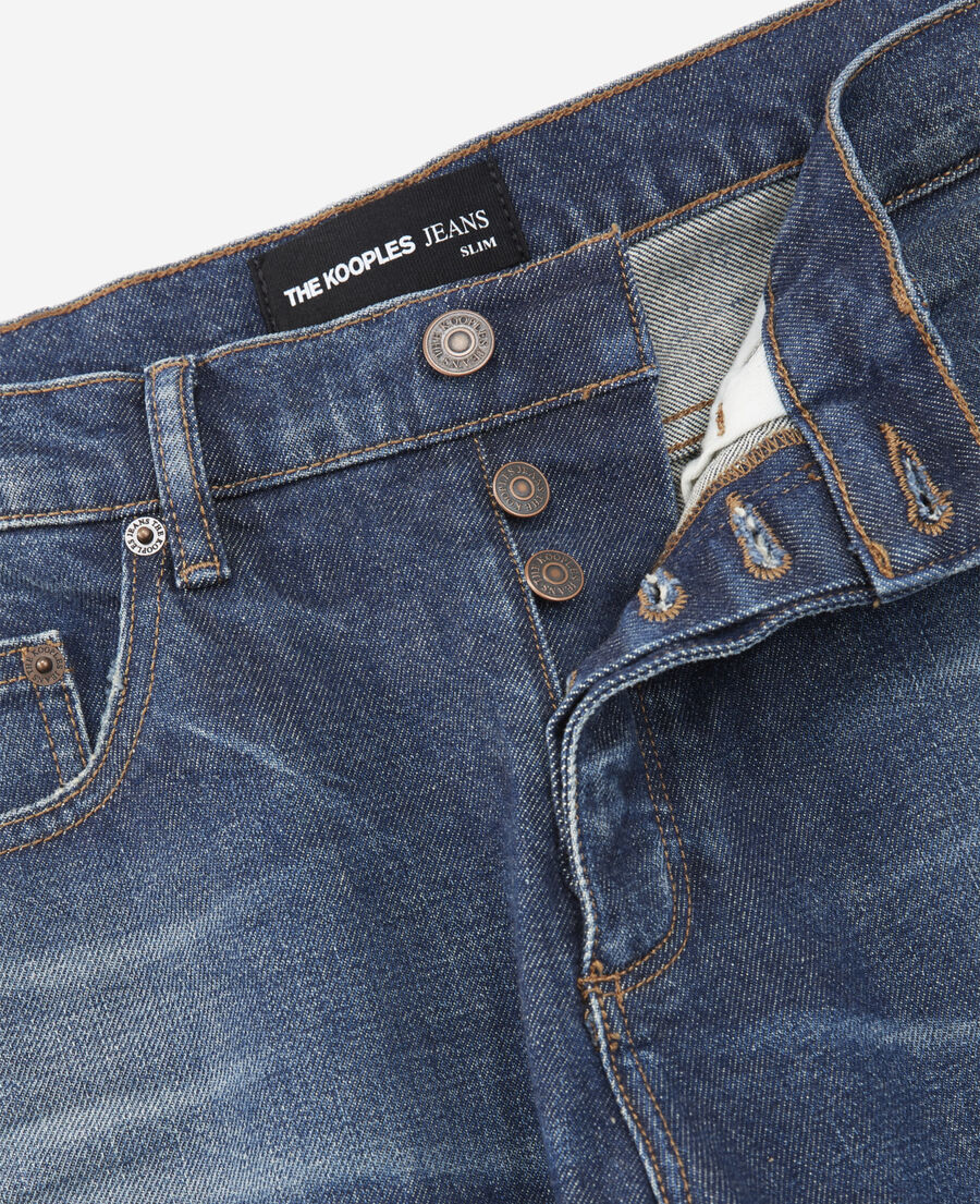 blue slim-fit faded jeans with five pockets