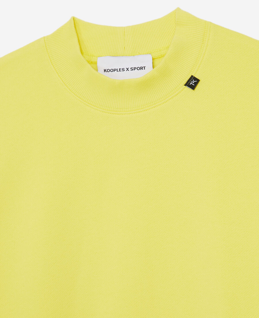 yellow sweatshirt with embossed logo