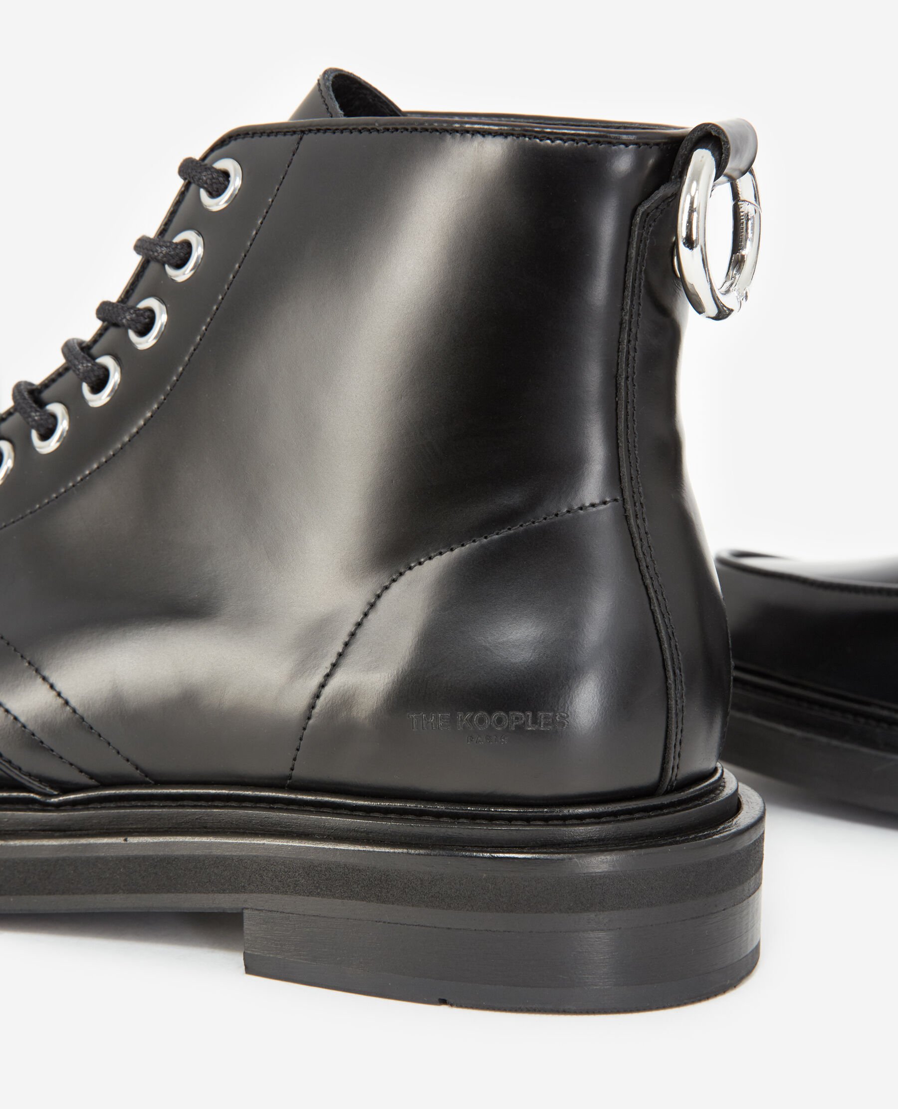 Lace up black boots in leather