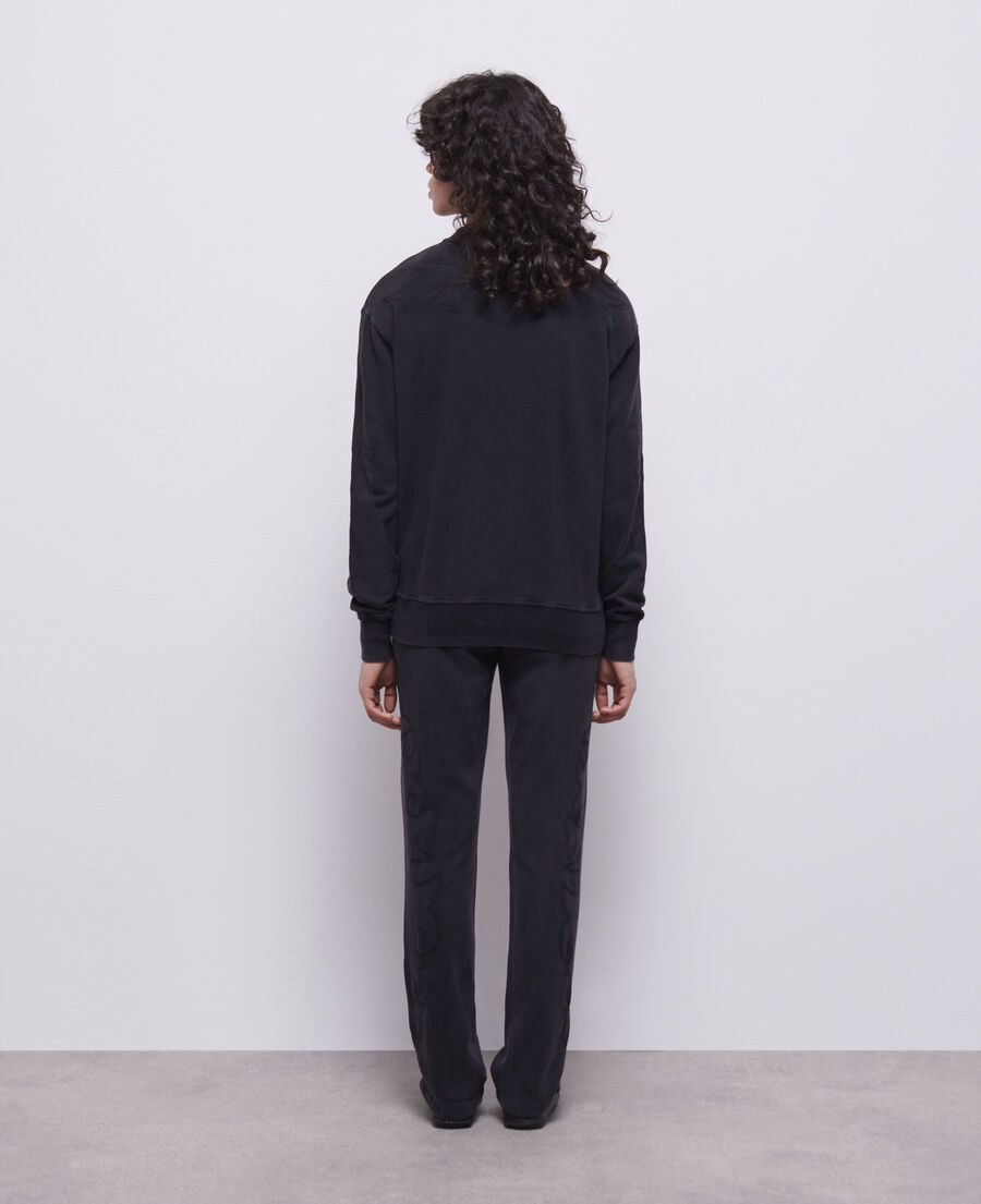 black sweatshirt with western-style embroidery