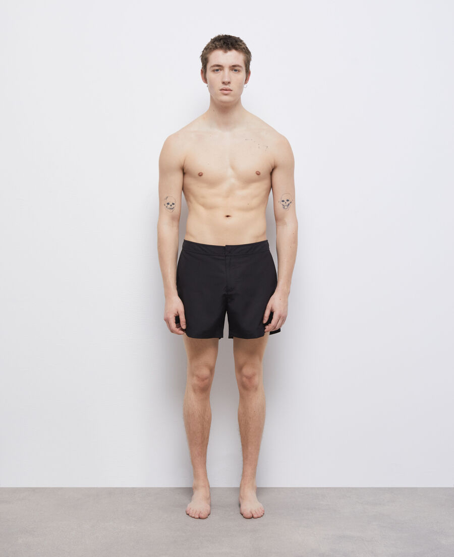 black swim shorts with logo