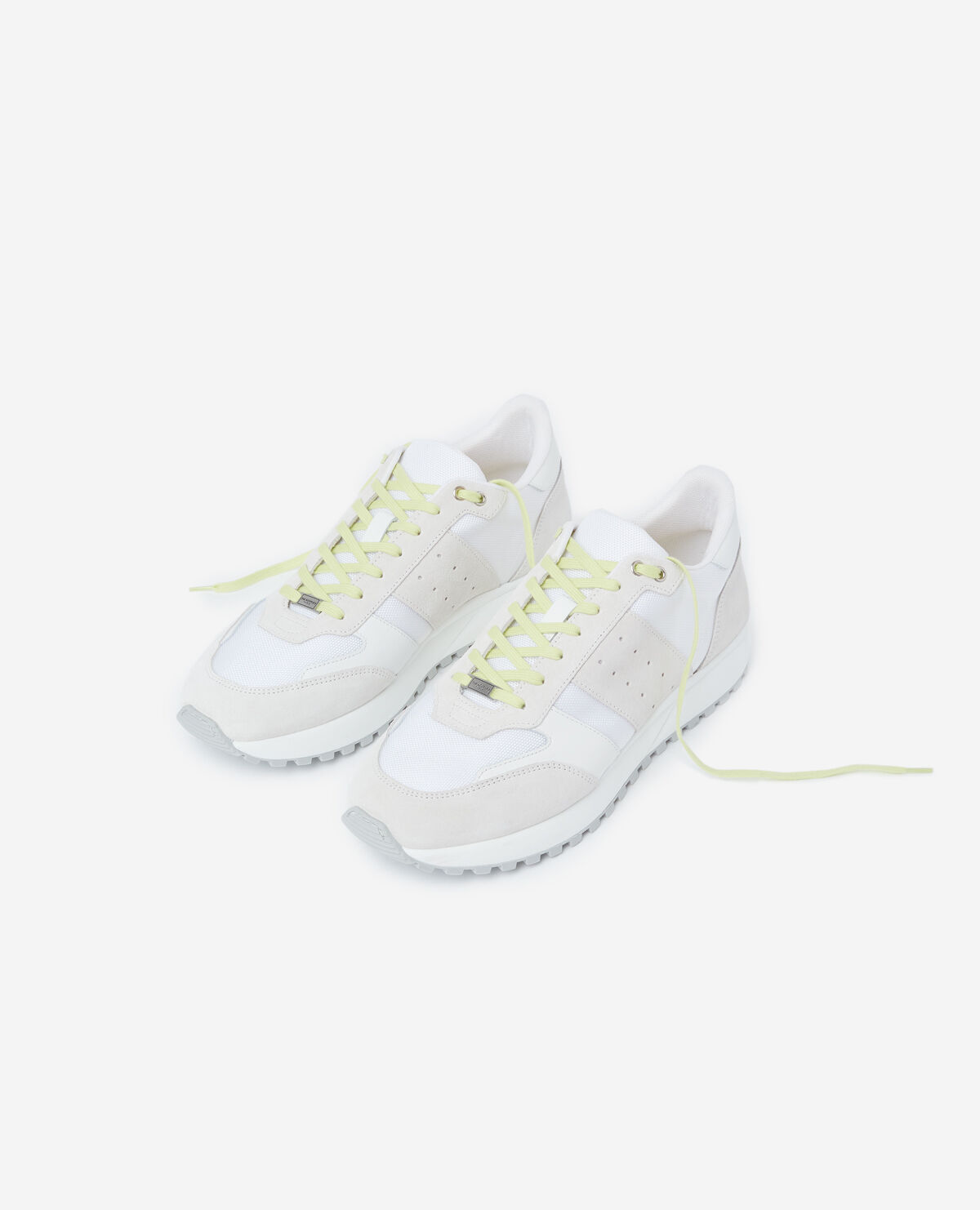 White retro trainers with textured tread sole