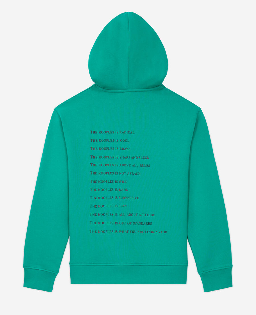 grünes sweatshirt mit „what is“-schriftzug