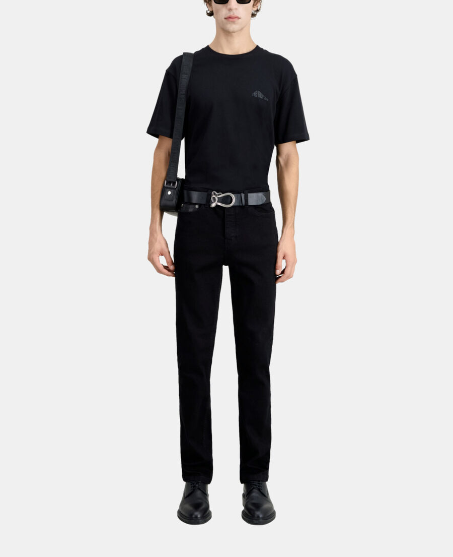 schwarze slim-jeans mit tasche aus leder
