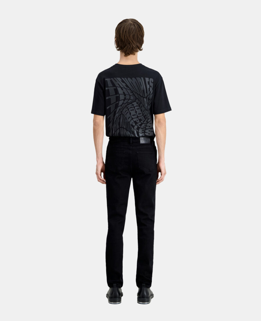 schwarze slim-jeans mit tasche aus leder
