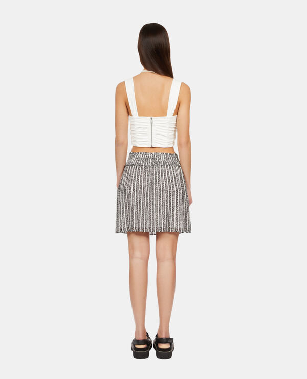 The Kooples WOMEN BLACK WHITE short printed skirt with smocks