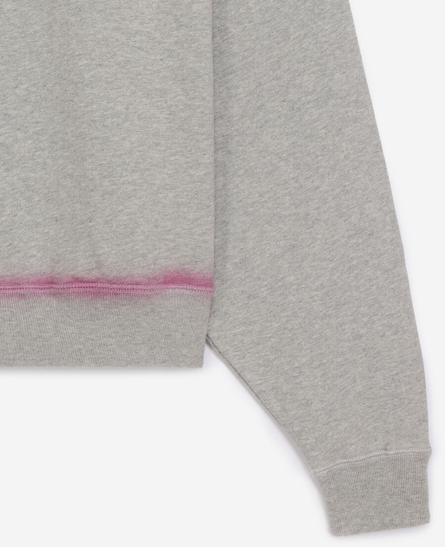 grey sweatshirt with pink details and fading