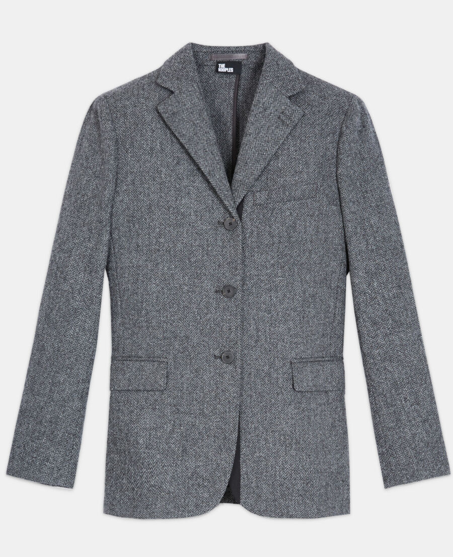 graue wolljacke mit motiv