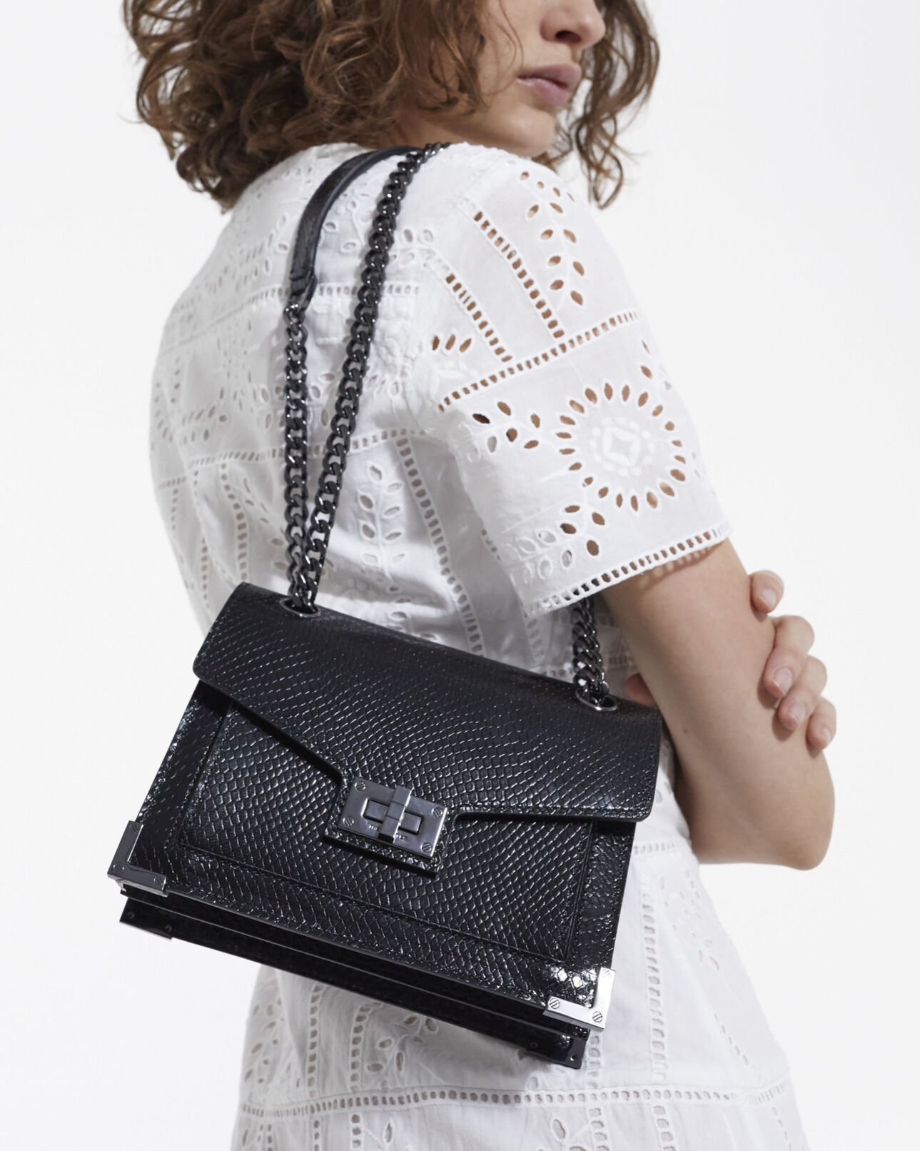 The Kooples WOMEN BLACK emily small bag in black python-effect leather