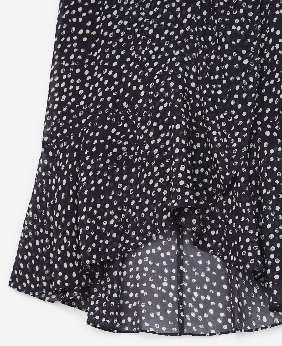 long flowing navy blue skirt with polka dots