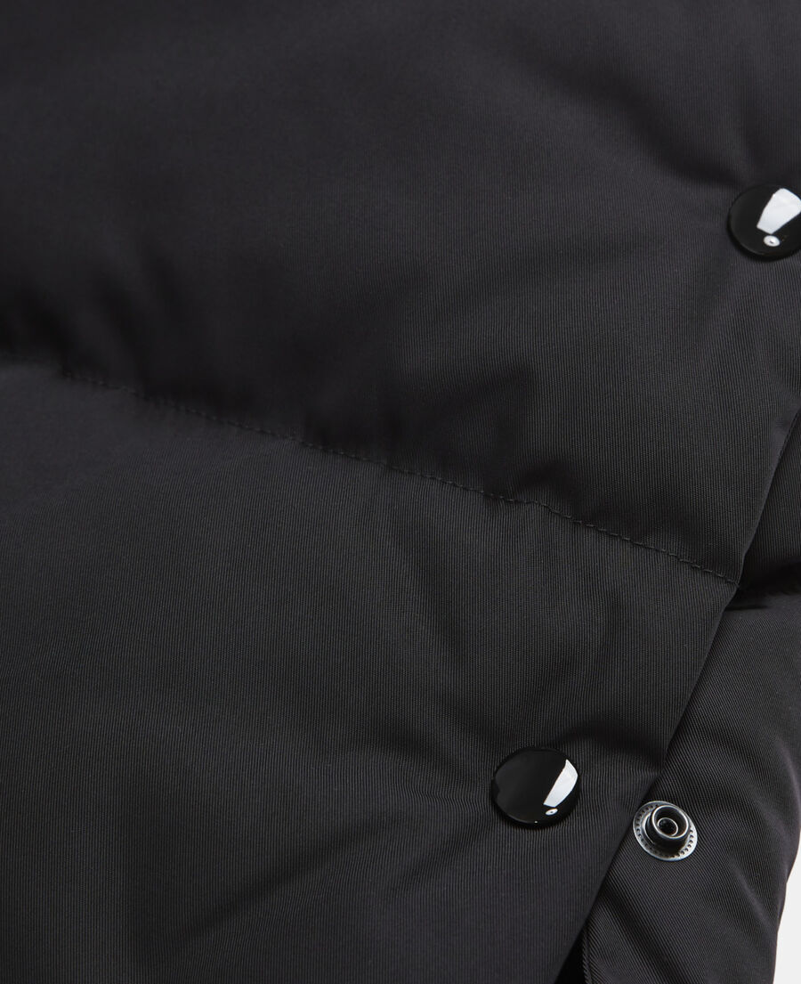 long black down jacket with straps and logo