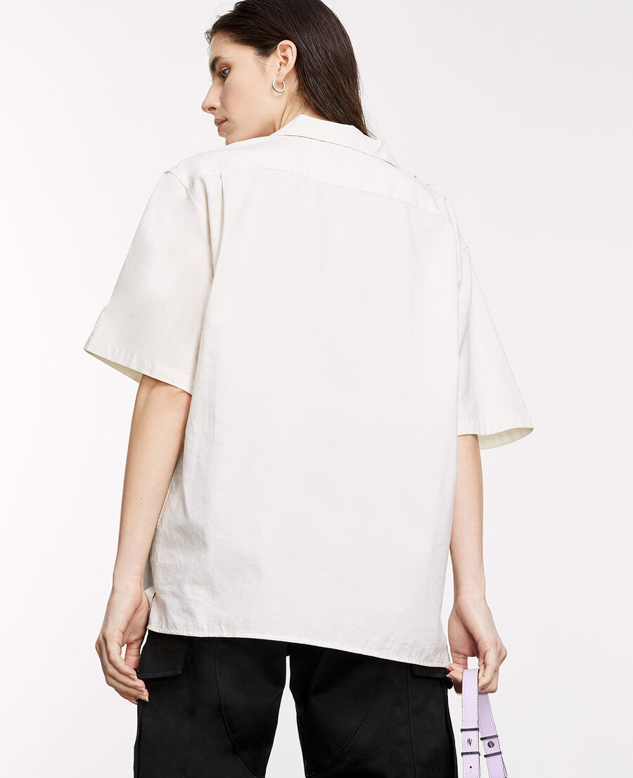 beige shirt with breast pockets
