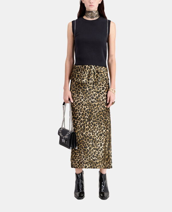 pull noir en maille avec chaînes