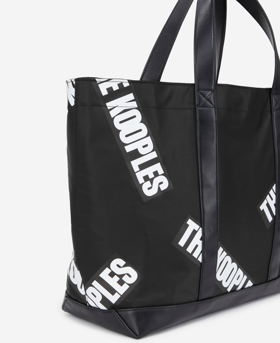 large black tote bag with tape logo