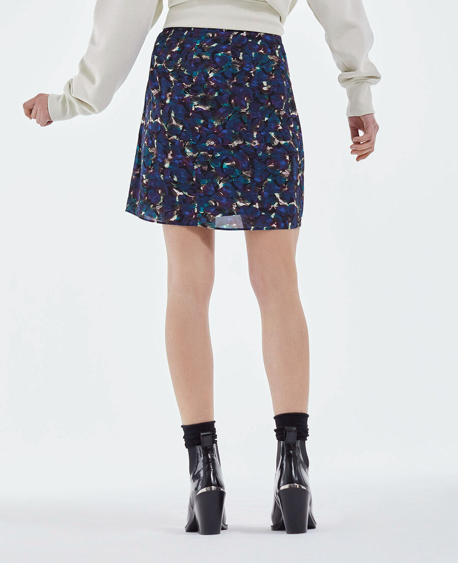 short blue flowing skirt with floral motif