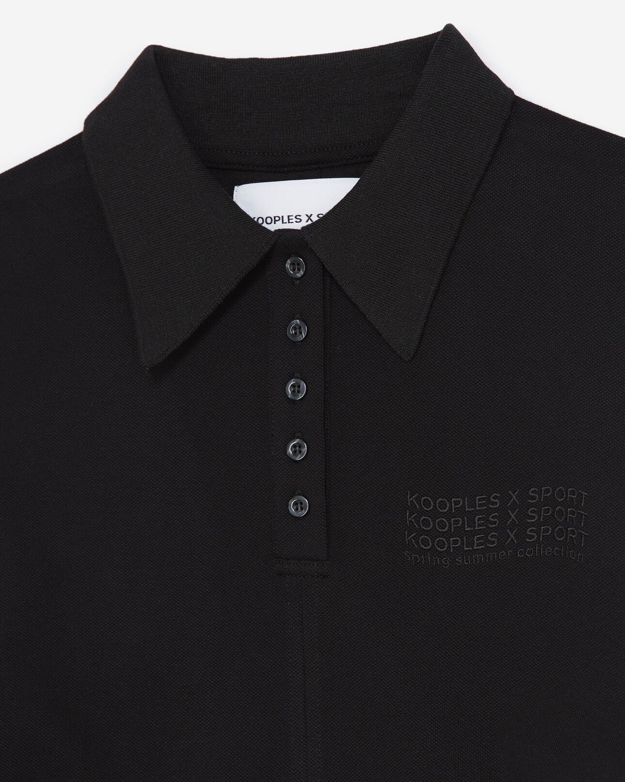 The Kooples FEMME BLACK polo noir ajusté logo détail serrage