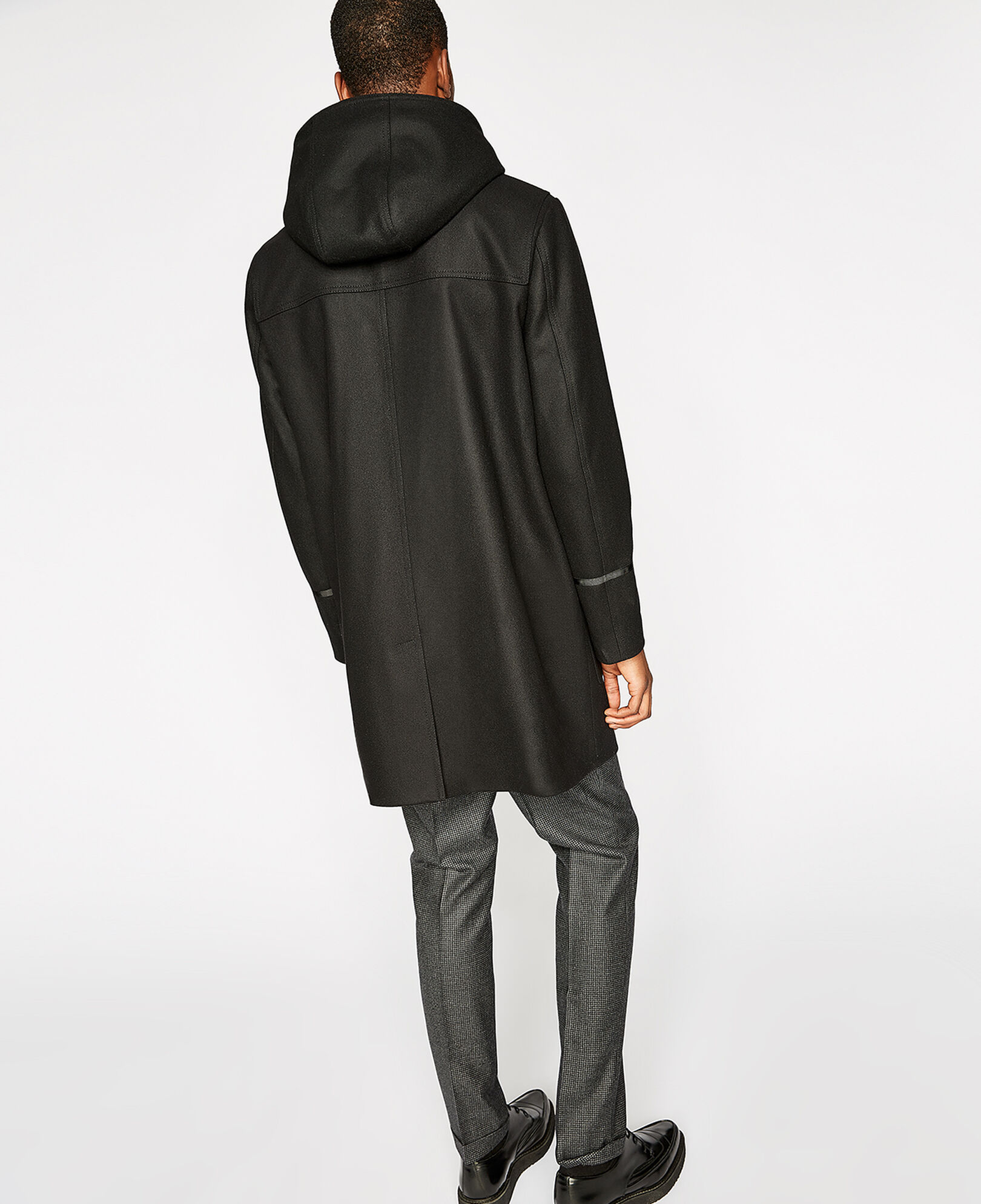 Black duffle coat with leather inserts