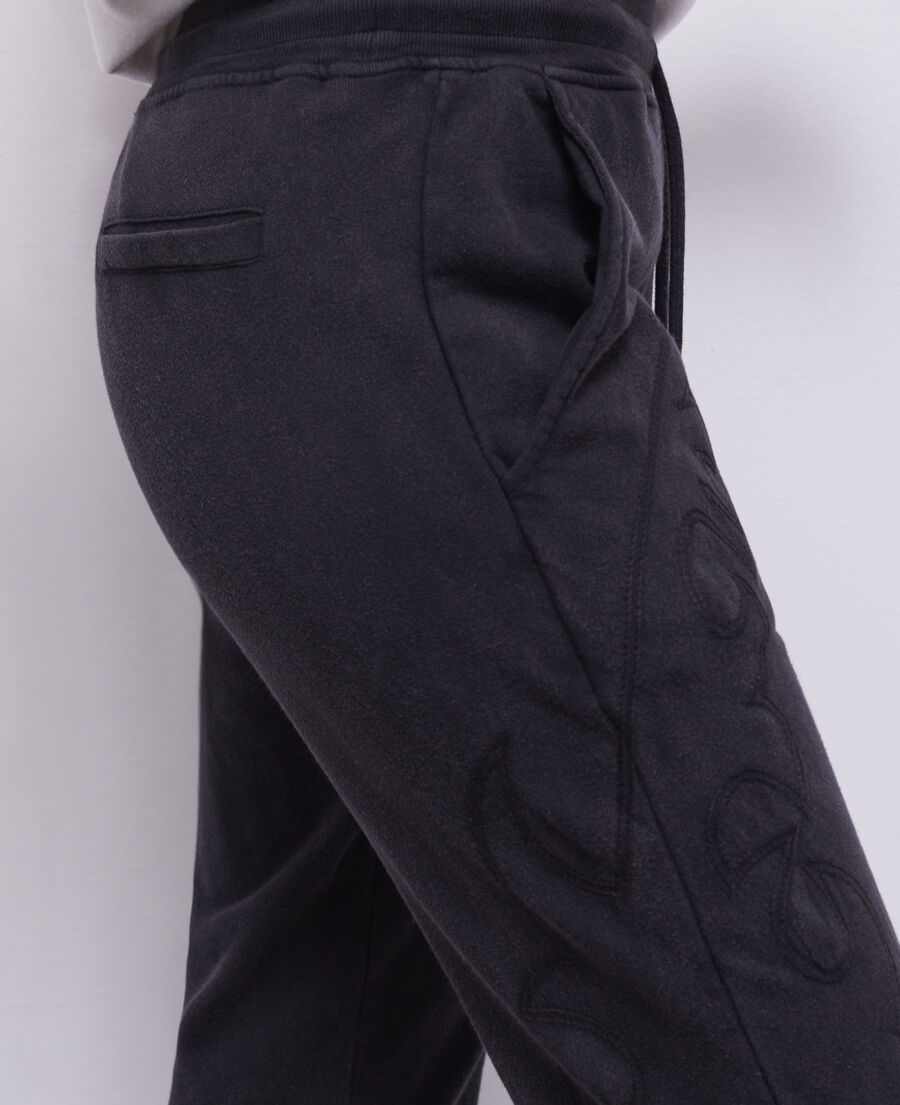 black joggers with western-style embroidery