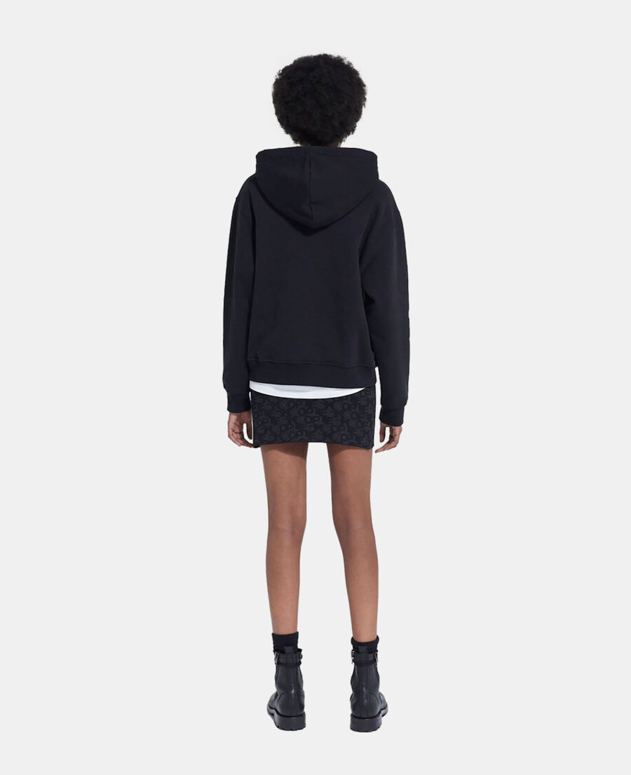 short black skirt with the kooples logo