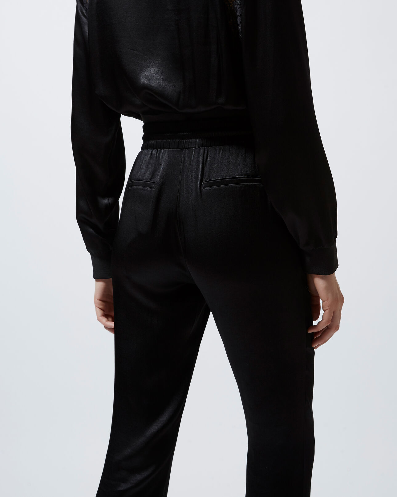 The Kooples WOMEN BLACK flowing black trousers with lace detailing