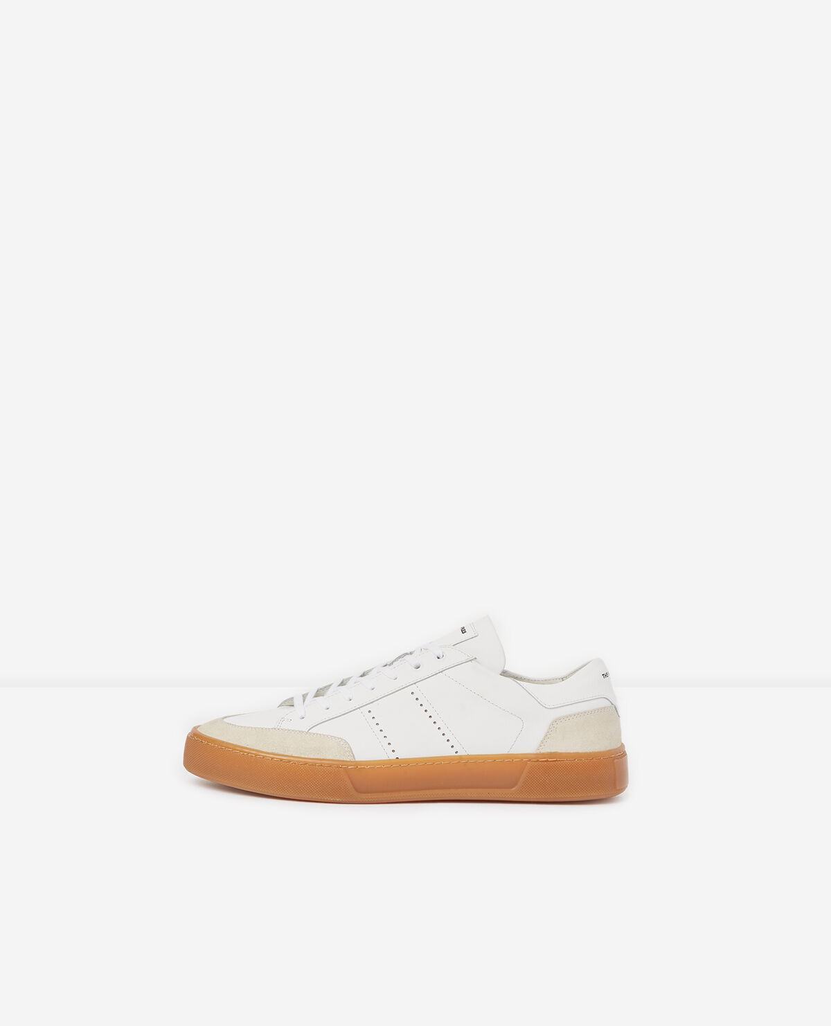 White low top leather trainers with rubber soles