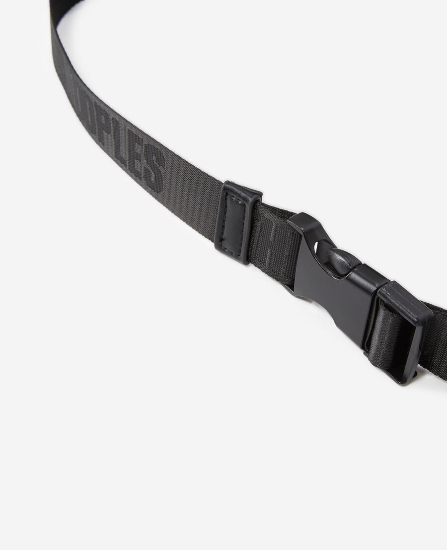 black waist bag with tape logo