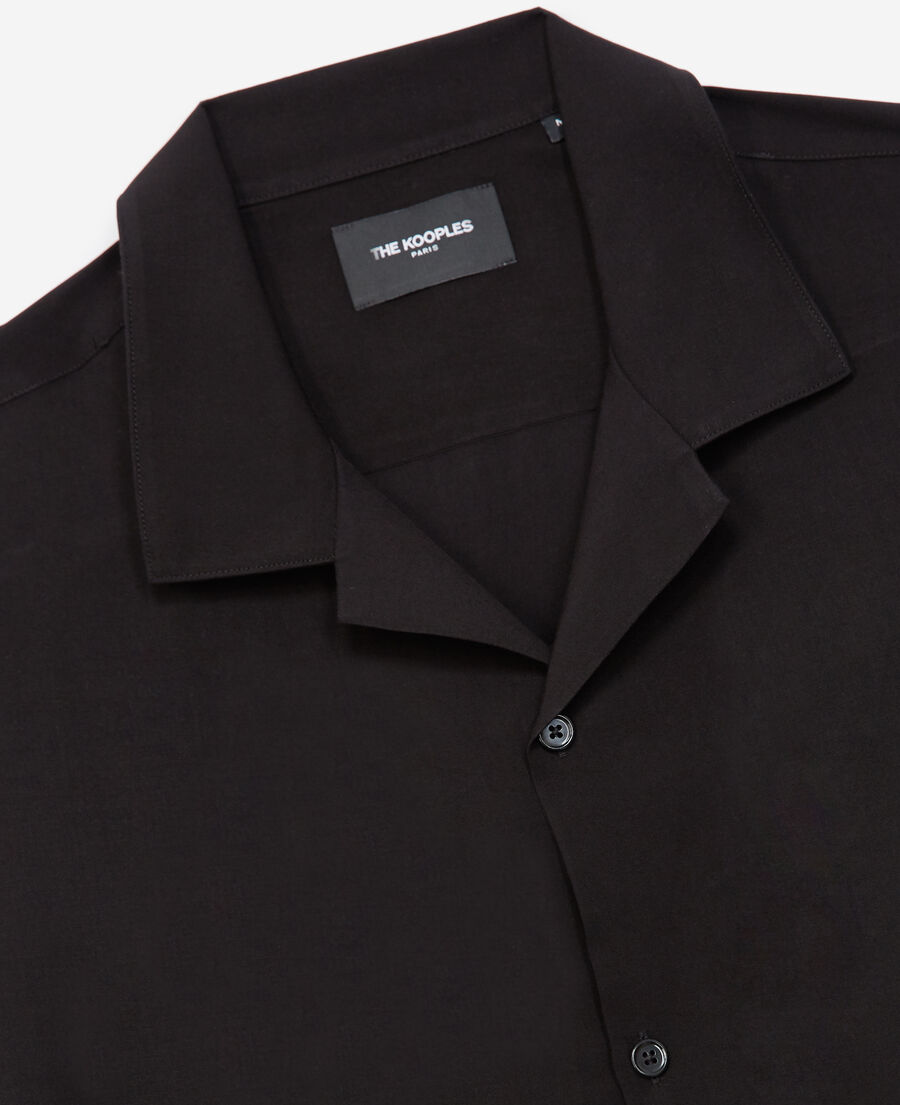flowing black shirt with short sleeves