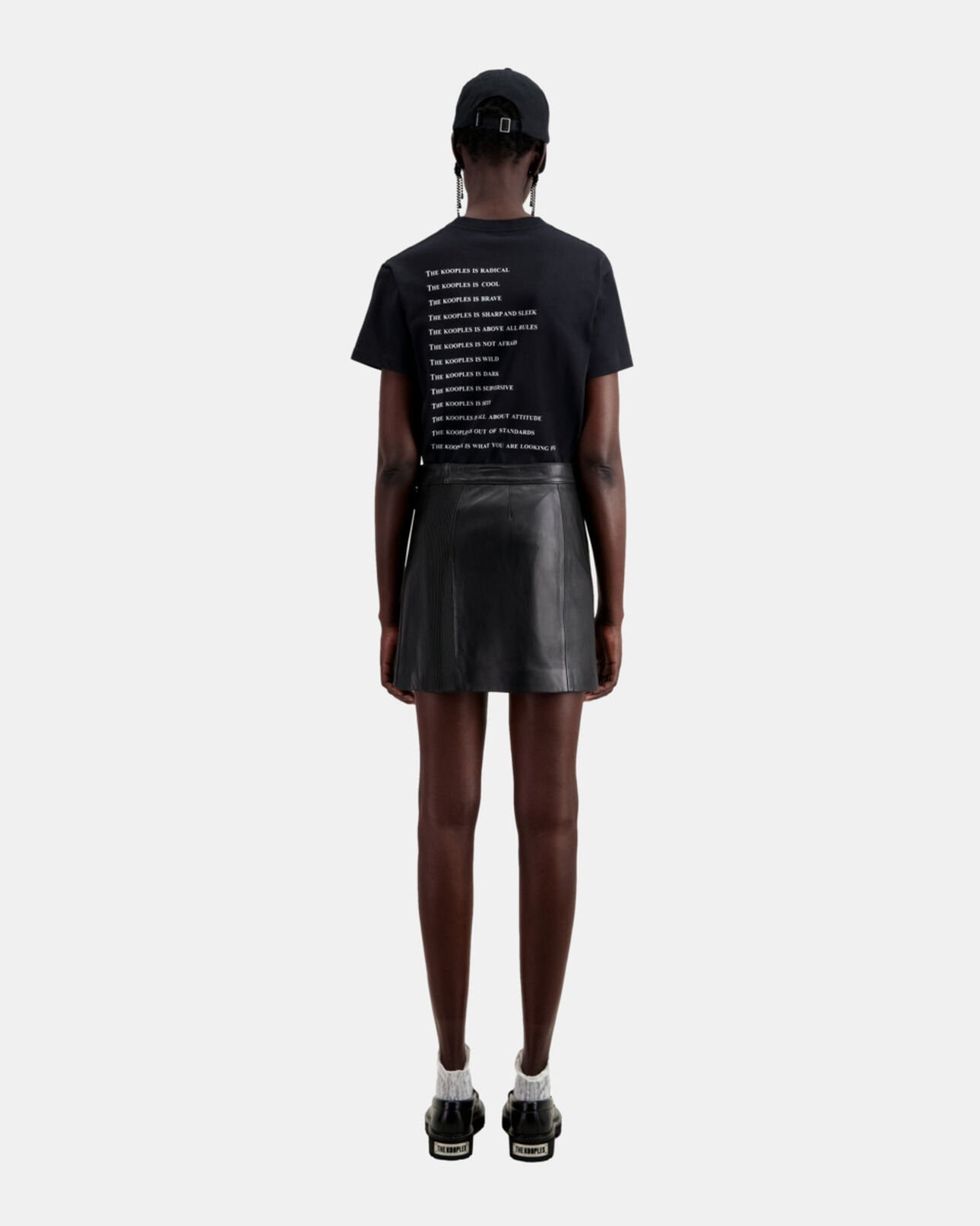 The Kooples WOMEN BLACK short black leather skirt with zip and pintuck details