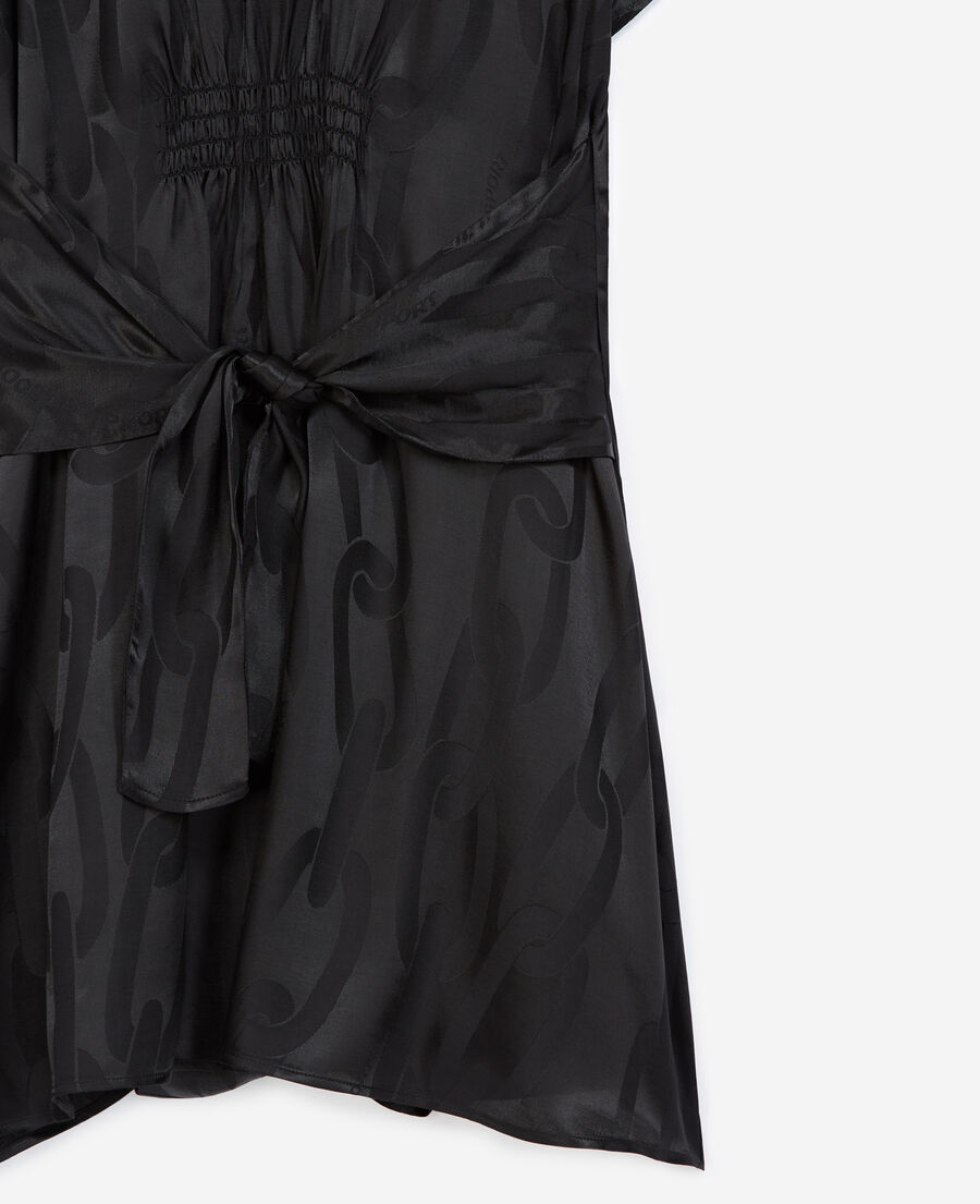 black dress with tone-on-tone chain motif