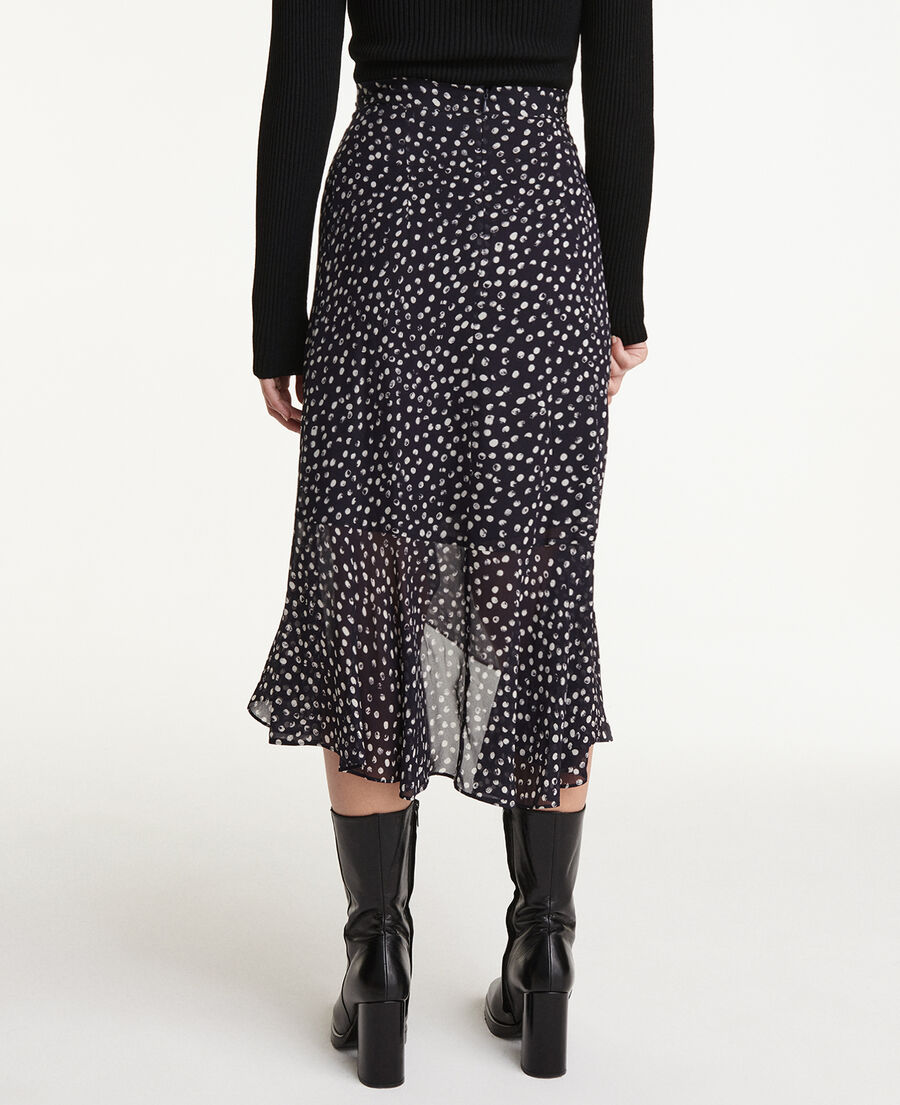 long flowing navy blue skirt with polka dots