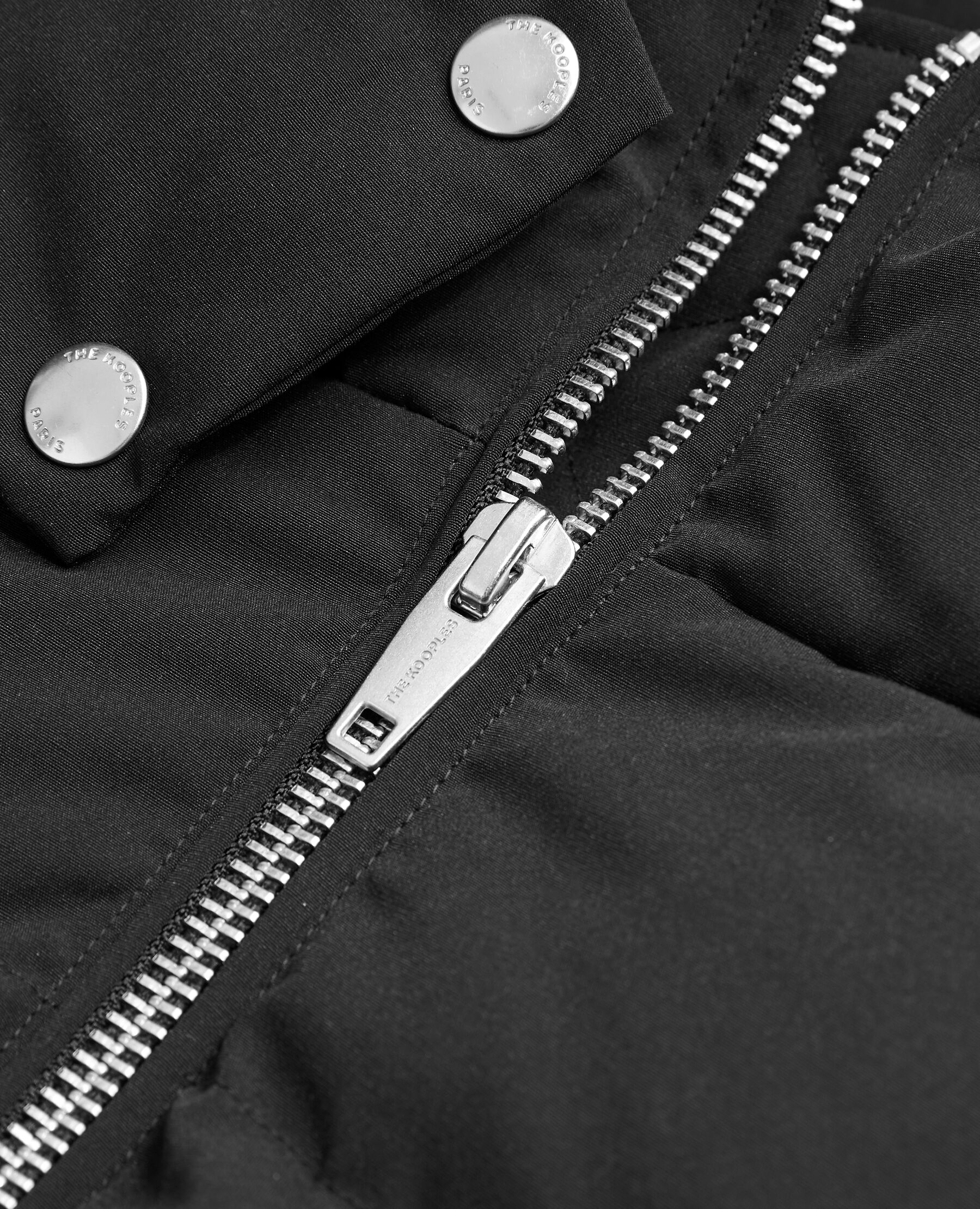 Black jacket with silver sales zipper
