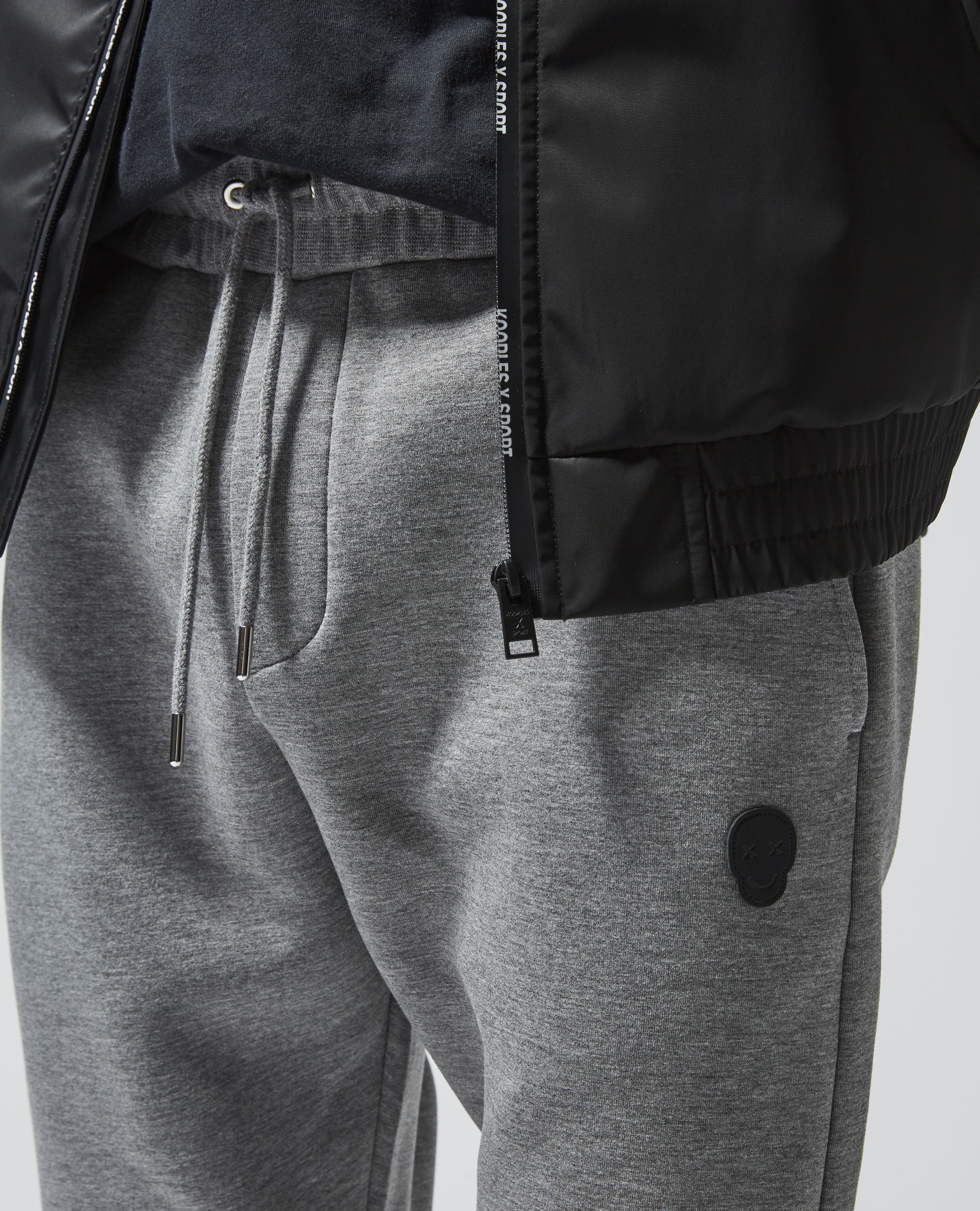 Skinny heather grey joggers w leather badge The Kooples