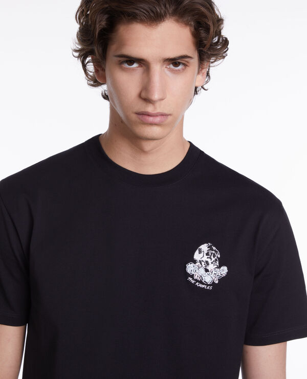 black t-shirt with vintage skull embroidery