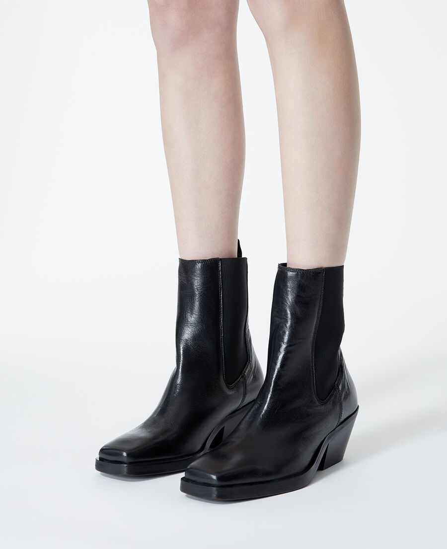 black leather ankle boots with flat sole